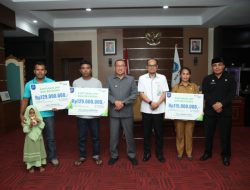 Ahli Waris 3 PTT Pemkot Ternate Terima Klaim BPJS dan JKM